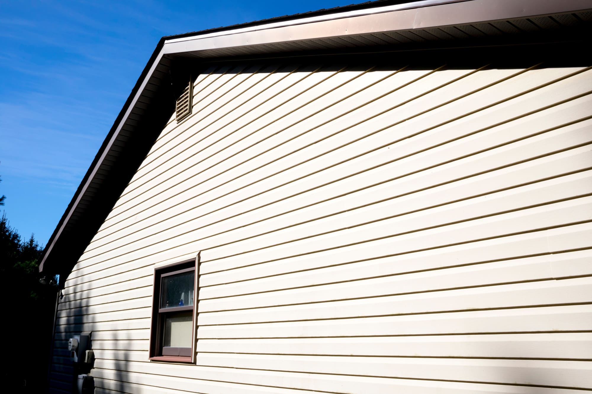 How can I best prepare my home for a siding replacement?